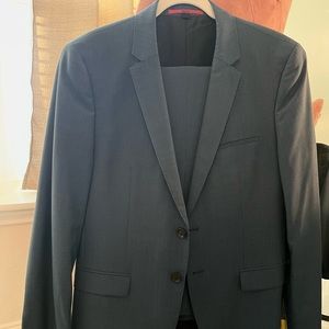Worn once, Hugo jacket and pants suit. Blue Microcheck pattern.